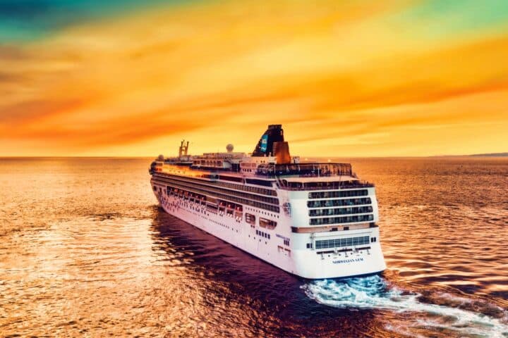 Aerial view of a cruise ship at sea.