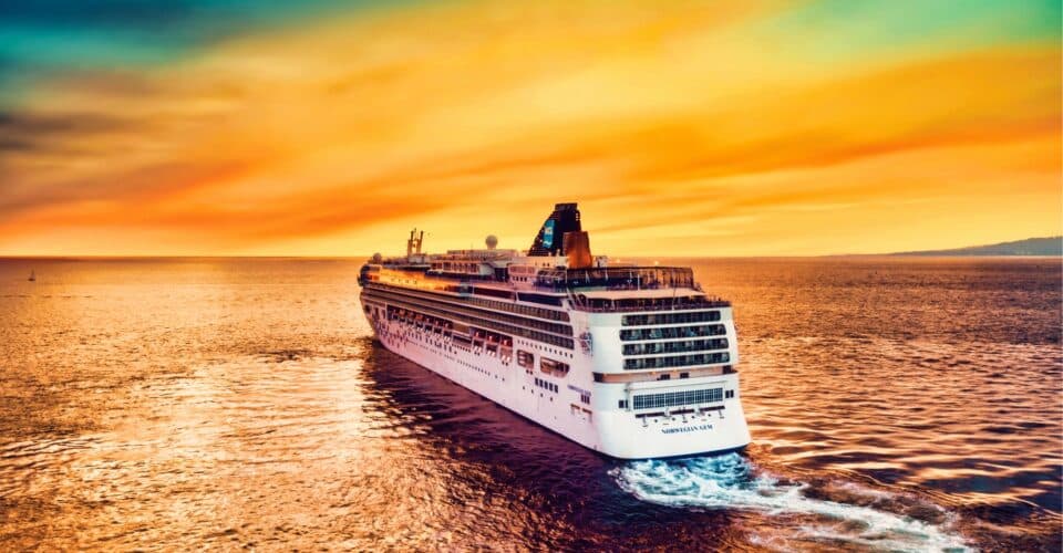 Aerial view of a cruise ship at sea.
