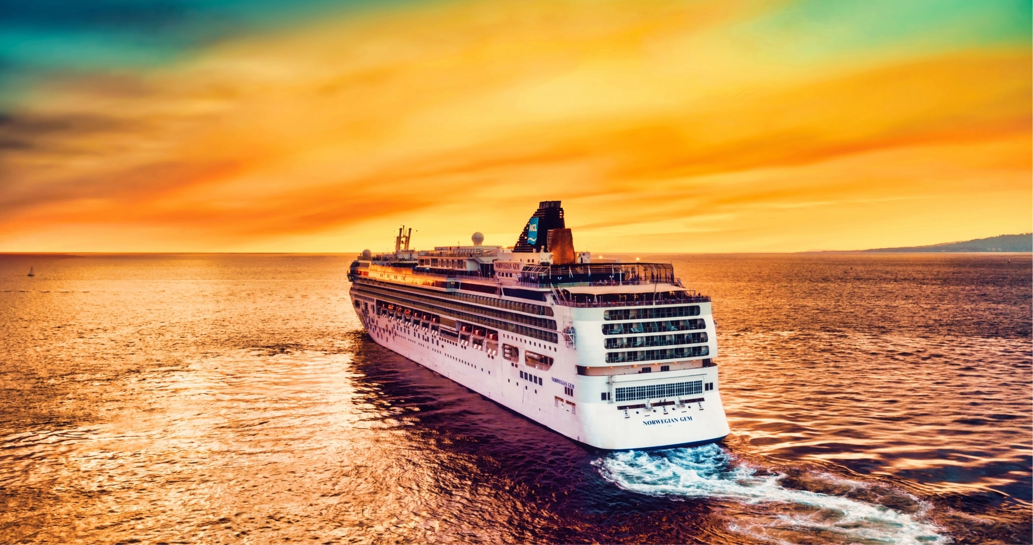 Aerial view of a cruise ship at sea.
