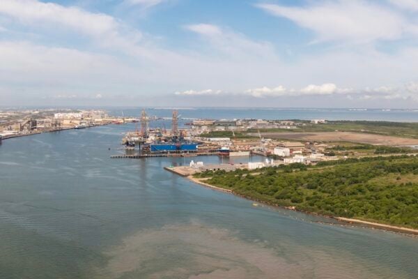 Aerial review of Galveston Harbor and Pelican Island.