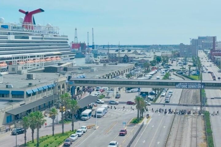 Cruise passengers crossing Harborside at 25th Street to board a Carnival ship. Cruise passengers crossing Harborside at 25th Street to board a Carnival ship.