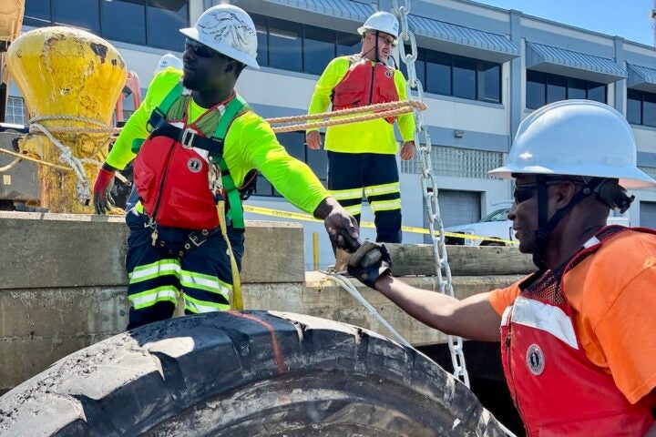The Construction and Maintenance (C&M) team installs a temporary tire fender at Cruise Terminal 25. The Construction and Maintenance (C&M) team installs a temporary tire fender at Cruise Terminal 25.